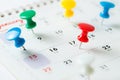 Thumb tack pin on calendar Royalty Free Stock Photo