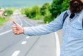 Thumb up sign not work in many parts of the world. Hand thumb up gesture try stop car road background. Thumb or hand Royalty Free Stock Photo
