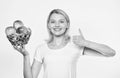 Thumb up. vitamin and dieting food. farming concept. healthy teeth. orchard, gardener girl with apple basket. Happy Royalty Free Stock Photo