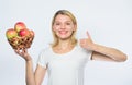 Thumb up. vitamin and dieting food. farming concept. healthy teeth. orchard, gardener girl with apple basket. Happy Royalty Free Stock Photo