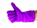 Thumb up in yellow rubber glove isolated on a white, man& x27;s hand.