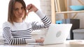 Thumbs Down Gesture by Beautiful Woman at Work