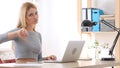 Thumbs Down, Woman Gesturing while Sitting in Office