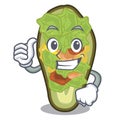 Thumbs up avocado stuffed served in cartoon bowl Royalty Free Stock Photo