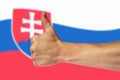 Thumbs up on a background of a flag of Slovakia
