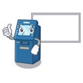 Thumbs up with board ATM machine isolated with the mascot Royalty Free Stock Photo