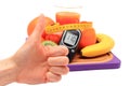 Thumbs up, glucometer and healthy ingredients with tape measure Royalty Free Stock Photo