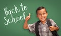 Thumbs Up Hispanic Boy in Front of Back To School Chalk Board Royalty Free Stock Photo