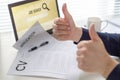 Thumbs up for job search. Applicant with positive attitude. Happy job seeker showing two hand gestures.