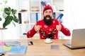 Thumbs up and keep out the cold. Happy hipster give thumbs ups in office. Bearded man smile with thumbs ups gesture Royalty Free Stock Photo