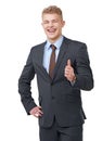 Thumbs up, portrait and business man laugh in studio for success, winning deal and yes sign on white background. Support Royalty Free Stock Photo