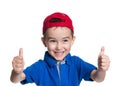 Thumbs up! Portrait of happy joyful beautiful little boy