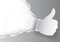 Thumbs up Ripped grey paper background. Royalty Free Stock Photo