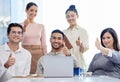 Thumbs up, success and business people in portrait for news on laptop, thank you and teamwork or like, yes and okay Royalty Free Stock Photo