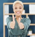 Thumbs up, success and work support hand sign worker in a office of a happy business woman. Portrait of winner