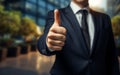 Thumbs up triumph businessmans gesture exudes confidence and success