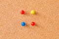 Thumbtacks on cork board Royalty Free Stock Photo