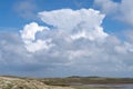 Thunder cloud formation - cumulonimbus above a dune landscape on Terschelling The Netherlands Royalty Free Stock Photo