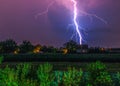 Thunder hitting house in the village Royalty Free Stock Photo