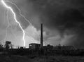 Thunder, lightnings and storm over abandoned factory in summer Royalty Free Stock Photo