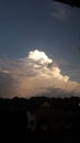 Thunder storm clouds gathering pace towering clouds Royalty Free Stock Photo