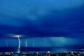 Thunder Storm, lightening, bolt strikes the sea near Rijeka city, on the croatian coastline.