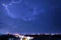 thunder storm lighting bolts in blue sky splitting and hit the Royalty Free Stock Photo