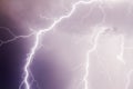 Thunder storm lightning strike on the dark purple cloudy sky Royalty Free Stock Photo