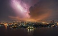 Thunder storm lightning strike over building area in Bangkok Royalty Free Stock Photo