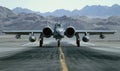 A-10 Thunderbolt II aircraft on runway, mountains in background, clear sky Royalty Free Stock Photo