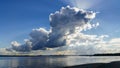 Thundercloud over Pumicestone Passage from Bribie Island in Queensland Australia looking over water toward the Glasshouse mountain Royalty Free Stock Photo