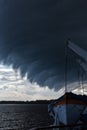 Thunderclouds over the river Royalty Free Stock Photo