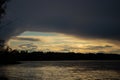 Thunderclouds at sunset over the Dnieper river in Ukraine Royalty Free Stock Photo