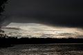 Thunderclouds at sunset over the Dnieper river in Ukraine Royalty Free Stock Photo