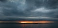 Thunderous sunset over the evening river Royalty Free Stock Photo