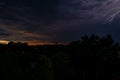Thunderstorm dark clouds black over city lightning Royalty Free Stock Photo