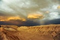 Thunderstorm developing over sand dune in Valle De La Luna in the Atacama Desert near San Pedro de Atacama, Chile Royalty Free Stock Photo