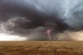 Thunderstorm with a lightning bolt and dark clouds Royalty Free Stock Photo