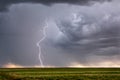 Thunderstorm lightning bolt with storm clouds Royalty Free Stock Photo