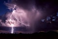 Thunderstorm lightning bolt strike with storm cloud
