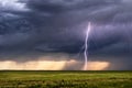 Thunderstorm with lightning bolt strike and storm clouds Royalty Free Stock Photo