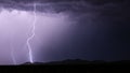 Thunderstorm lightning bolt strike with storm clouds Royalty Free Stock Photo