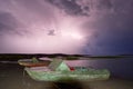 Thunderstorm with lightning on the lake. Royalty Free Stock Photo