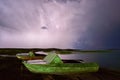 Thunderstorm with lightning on the lake. Royalty Free Stock Photo