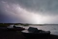 Thunderstorm with lightning on the lake. Royalty Free Stock Photo