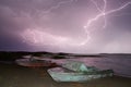 Thunderstorm with lightning on the lake. Royalty Free Stock Photo