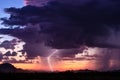 Thunderstorm lightning strike at sunset Royalty Free Stock Photo