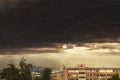 Dark Storm clouds loom over the city. Image of an impending thunderstorm Royalty Free Stock Photo