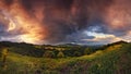 Thunderstorm In The Mountains. Panoramic Summer Landscape With Enchanting Stormy Sky, Storm Clouds, Sunny Valley And Small Rural H