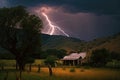 Thunderstorm over farmhouse with forked lightning strike. Royalty Free Stock Photo